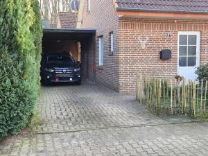 Carport en parkeerplaats